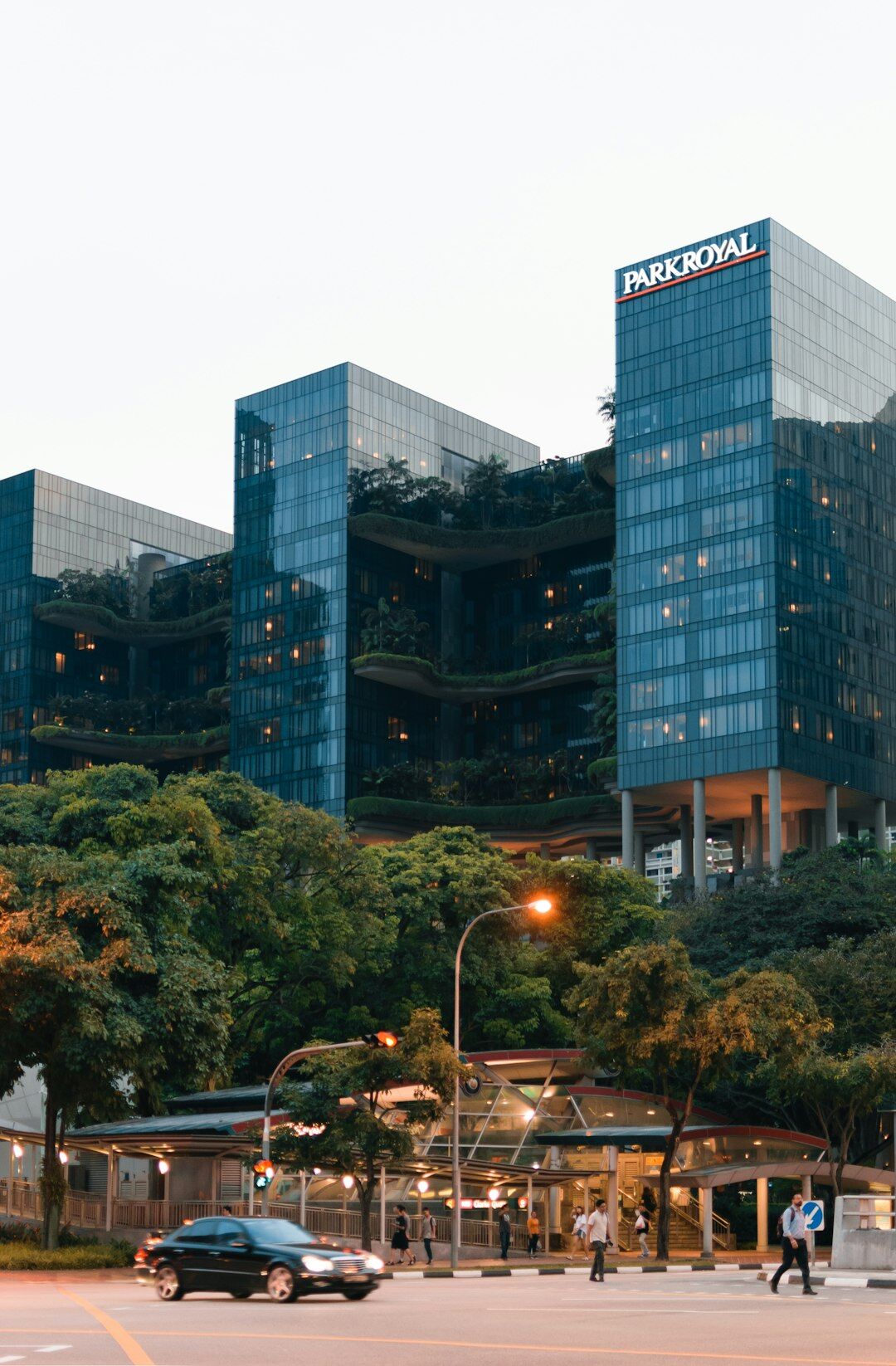 Diverse team of insurance professionals in a modern Singapore office meeting